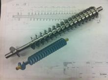 Variable pitch tapered screw